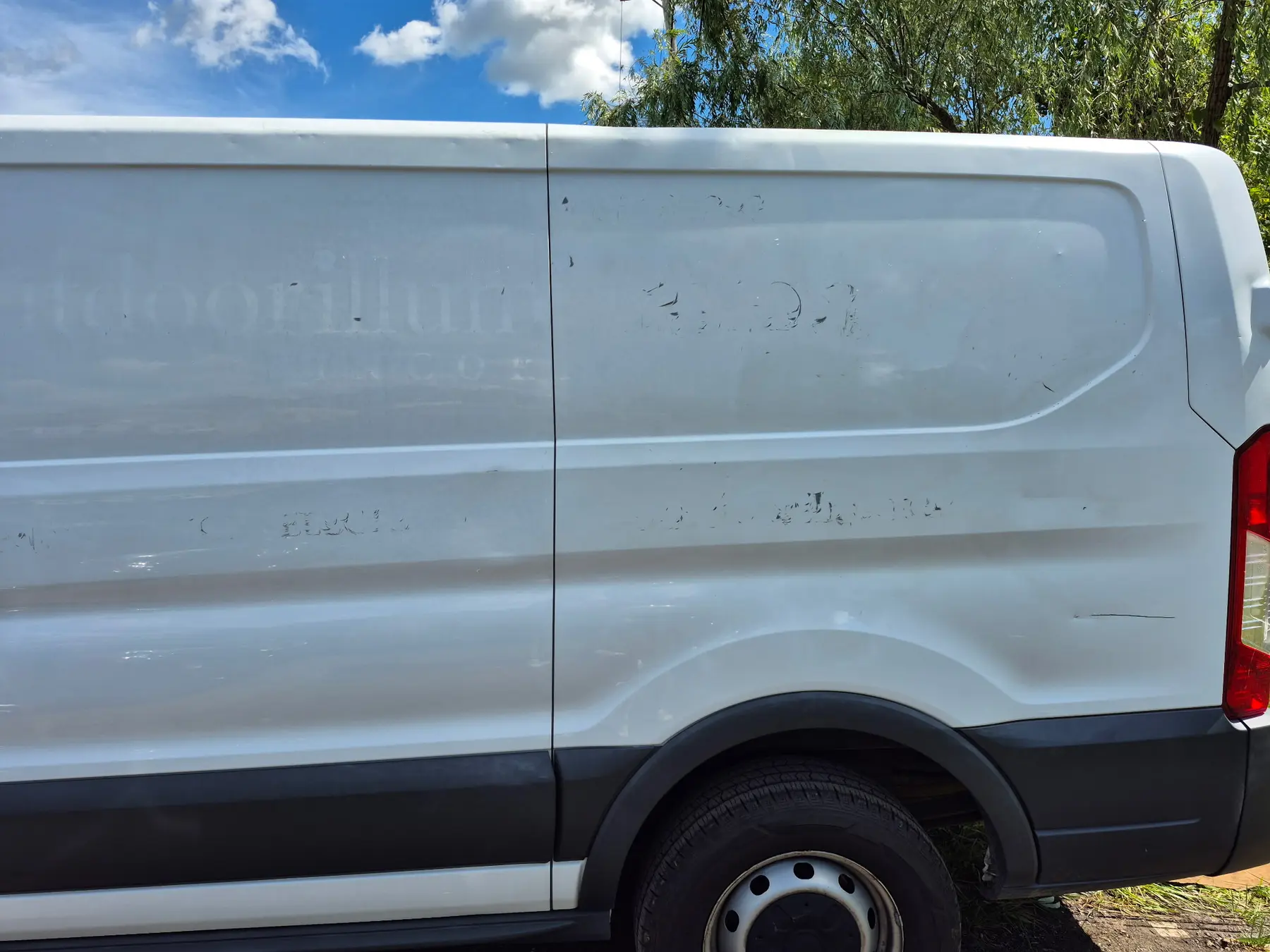 White cargo van panel before correction